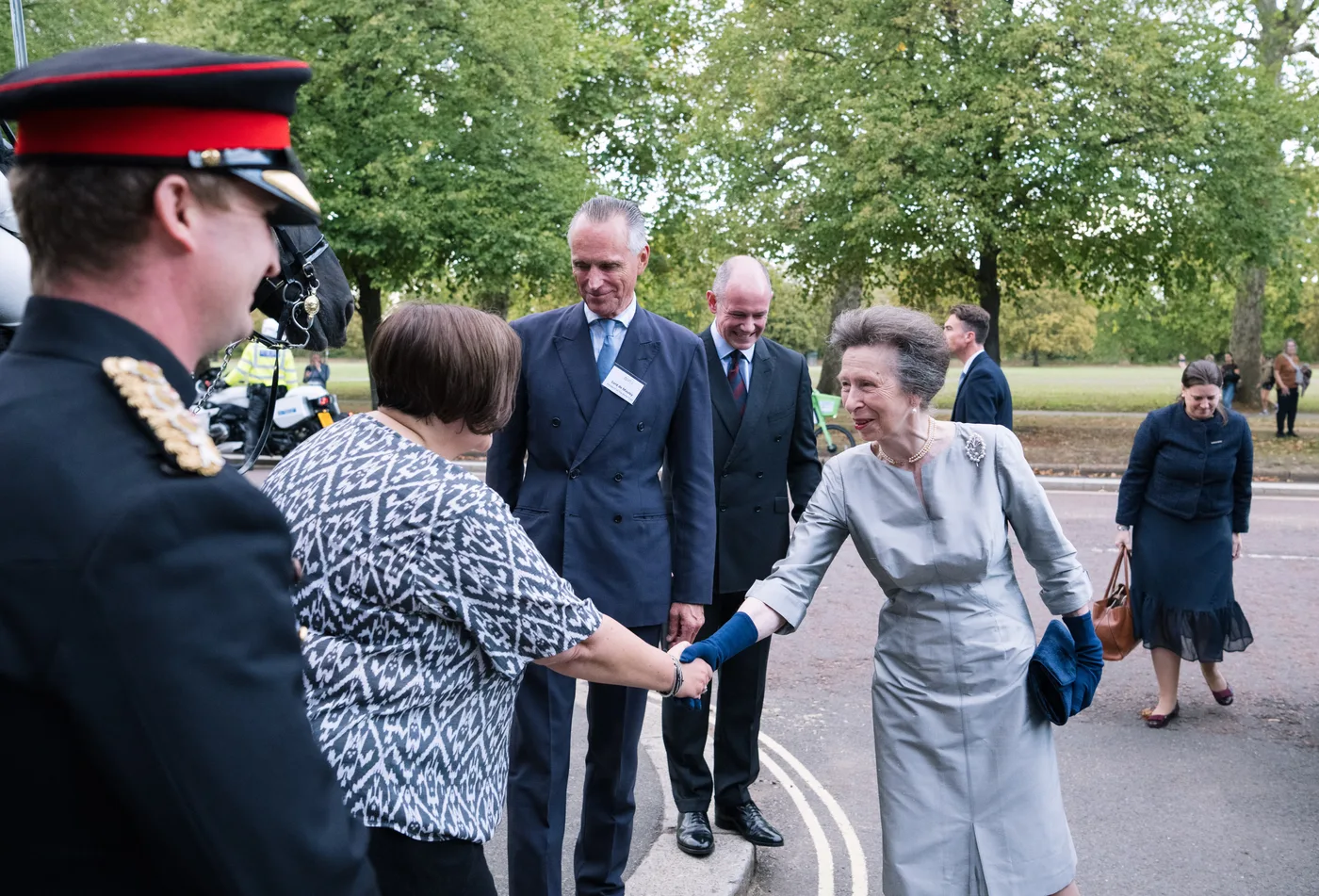 The Princess Royal shakes hands with Jeanette Allen, chief executive of The Horse Trust, at Hyde Park Barracks
